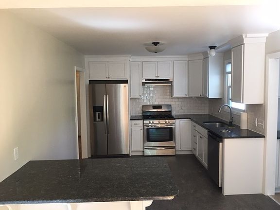 Kitchen open to dining room, w marmoleum