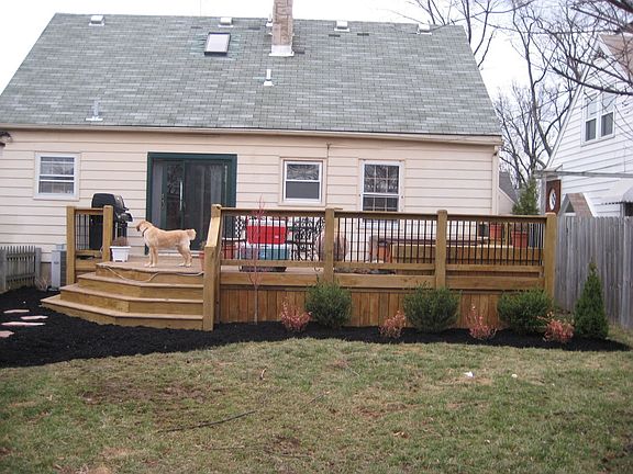 View of new back deck, landscaping.