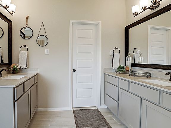 Dual vanities in the owner s bath
