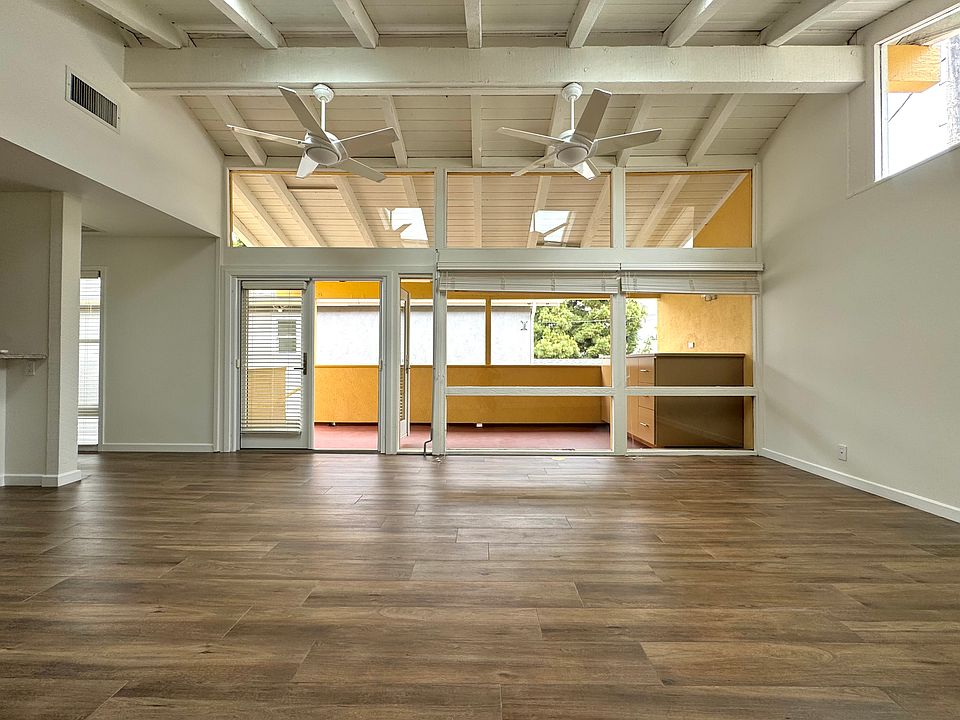 living area with view to private, covered, patio and outside