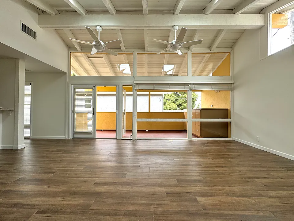 living area with view to private, covered, patio and outside