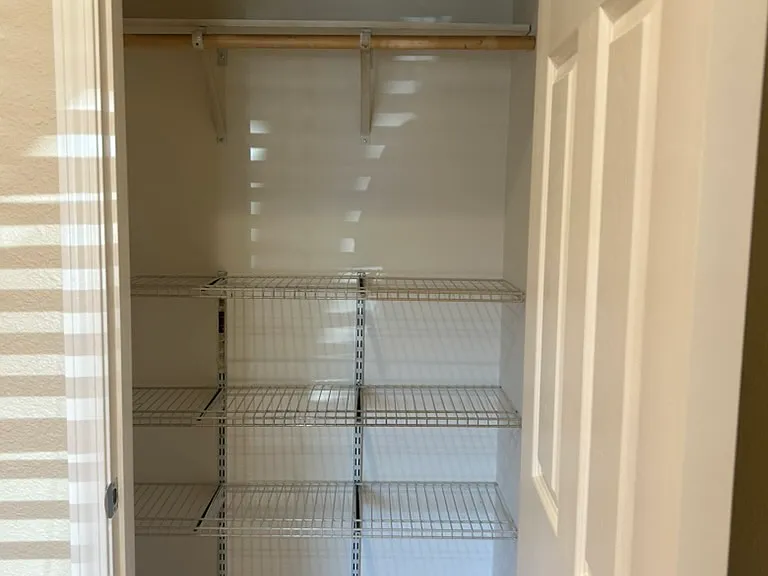 Downstairs bedroom closet, freshly painted interiors