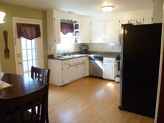 Dishwasher, Range, Built-in Microwave & Refrigerator