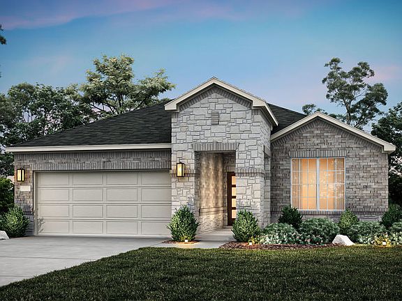 The Emory, a one-story home with 2-car garage, shown with Home Exterior 34
