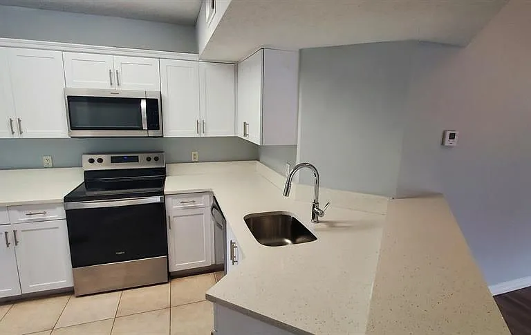 9033 Wiles Rd — Photo 13
