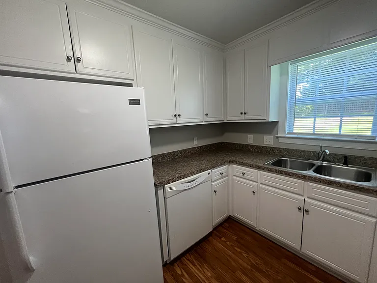 Kitchen with all appliances furnished...stove.. refrigerator....microwave....dishwasher!