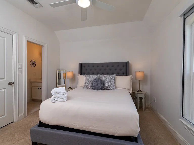 Cozy queen bedroom with private ensuite bathroom access.