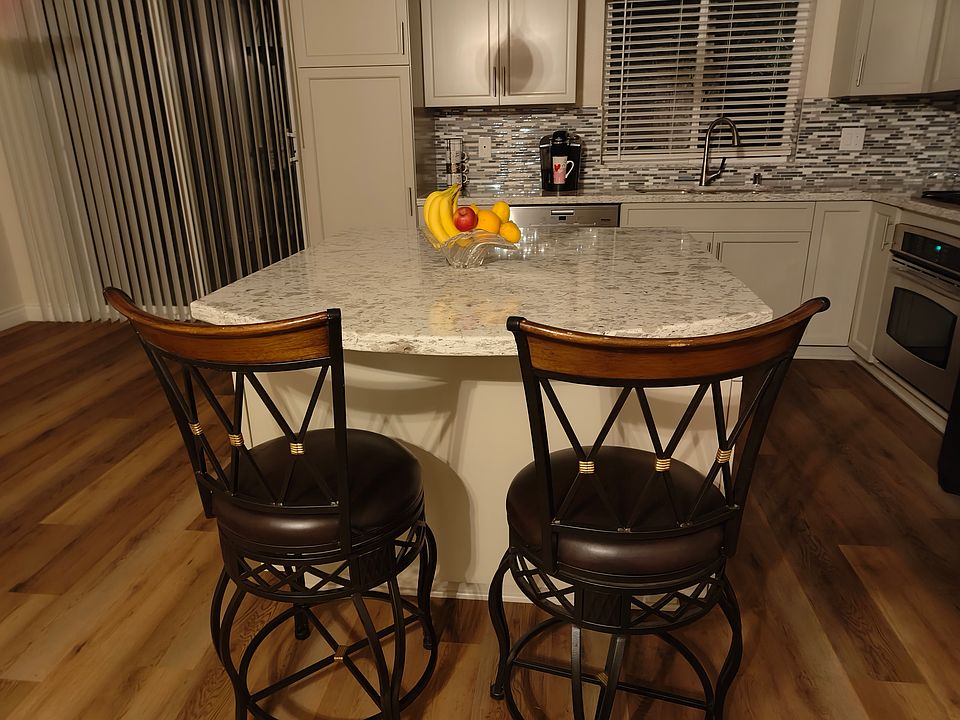 Breakfast Bar- Features pull out shelves with abundant room for pots and pans...