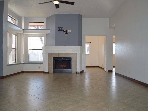 Living Room with fireplace & bay windows