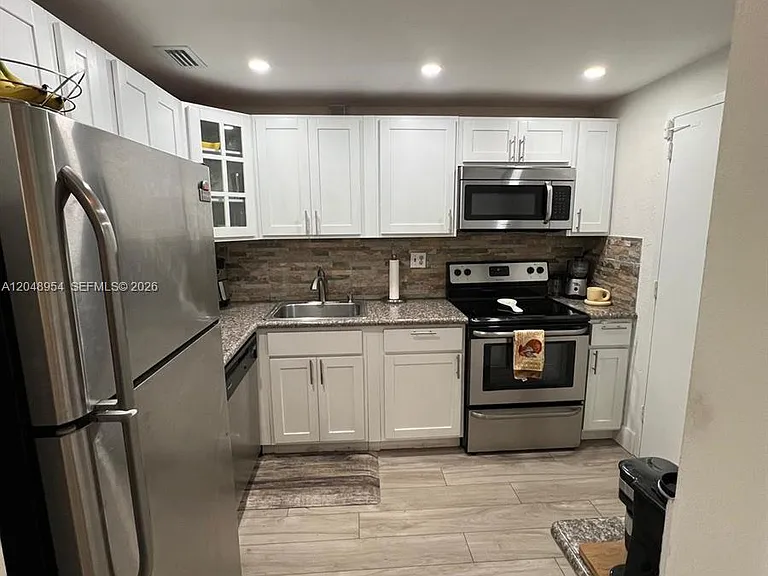 1470 NE 125th Ter #509 — Photo 8