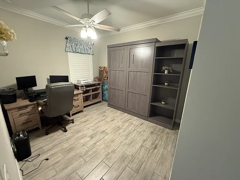 Bedroom #2 - Murphy bed with shelves. Desk with chair (Monitors not included)