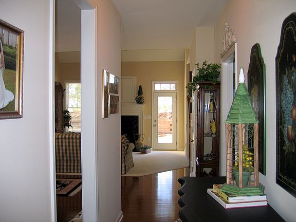 Deep-Toned Hardwoods & Upgraded Carpeting