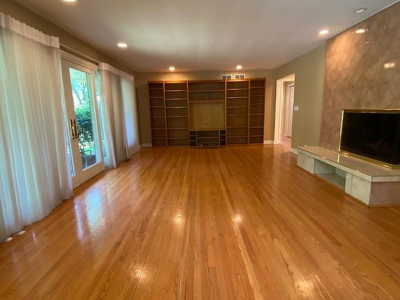 Attached bookcase removed.