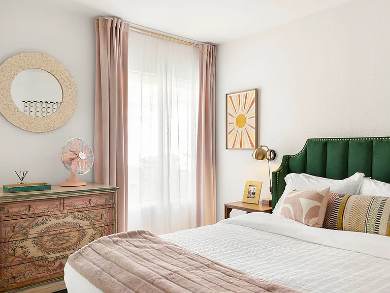 Guest room with queen size bed, dresser and large closet.
