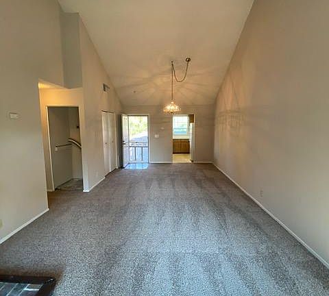 Living room with washer/dryer hook-up in hall closet