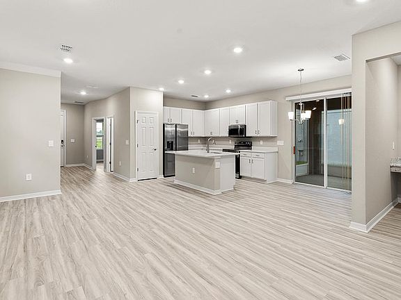 Enjoy a spacious, open living area with LVP flooring.