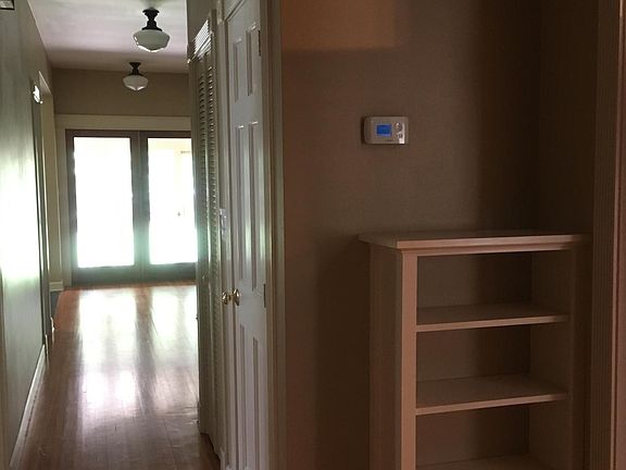 living room to right then master bedroom. On the left, large front bedroom, smaller bedroom, bathroom, then kitchen