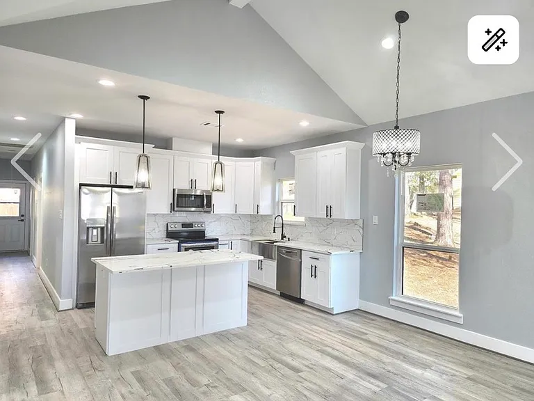 Kitchen and dining area prior to being furnished.