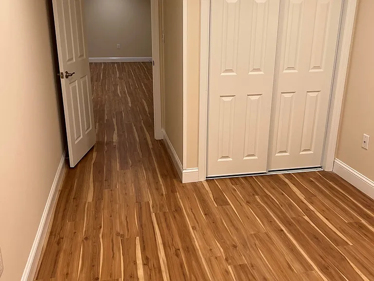 Guest Bedroom with view towards dining / living room