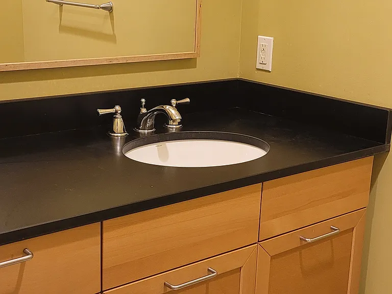 Master Bath Sink and Vanity with storage drawers.