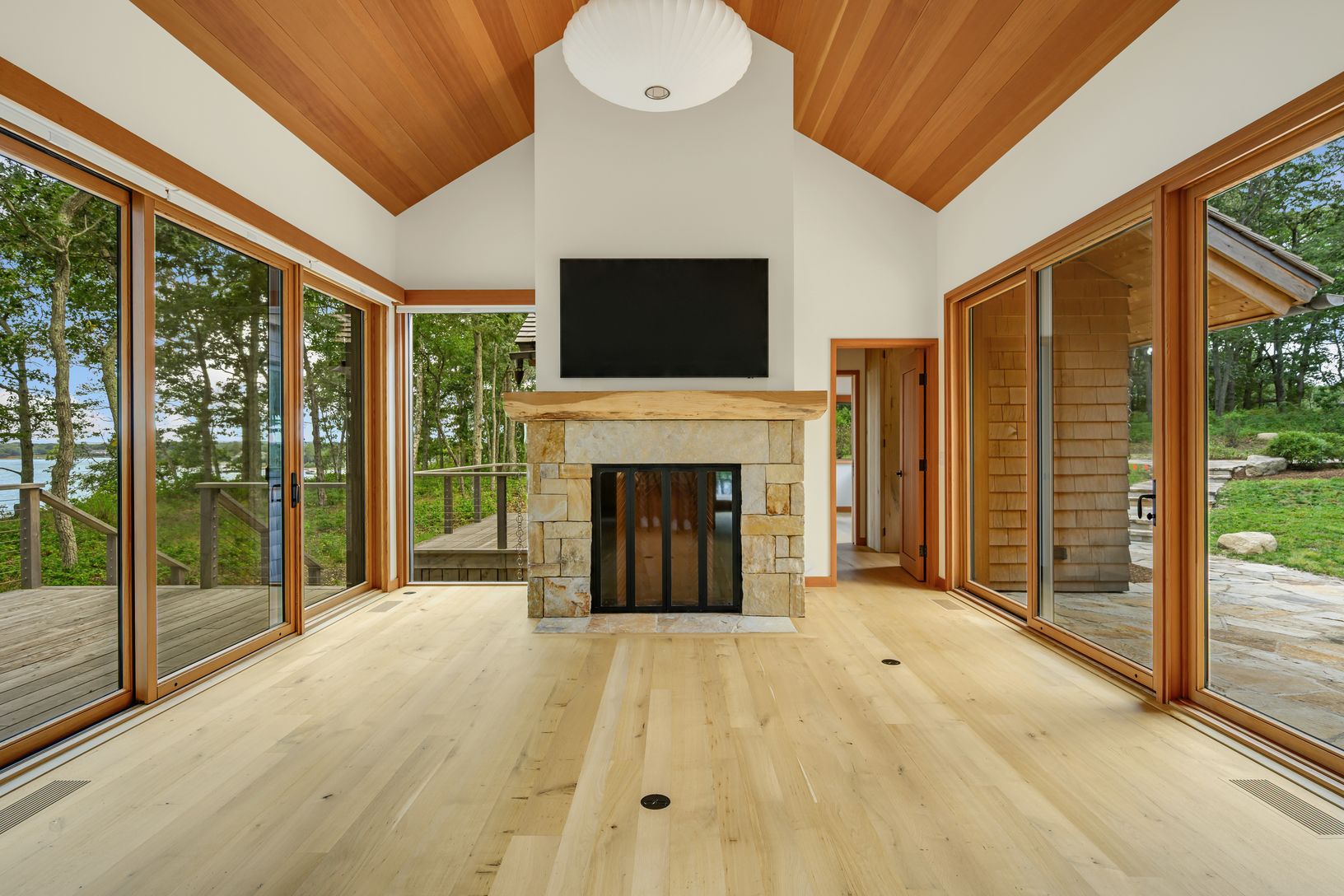 Living room with wood burning stone fireplace