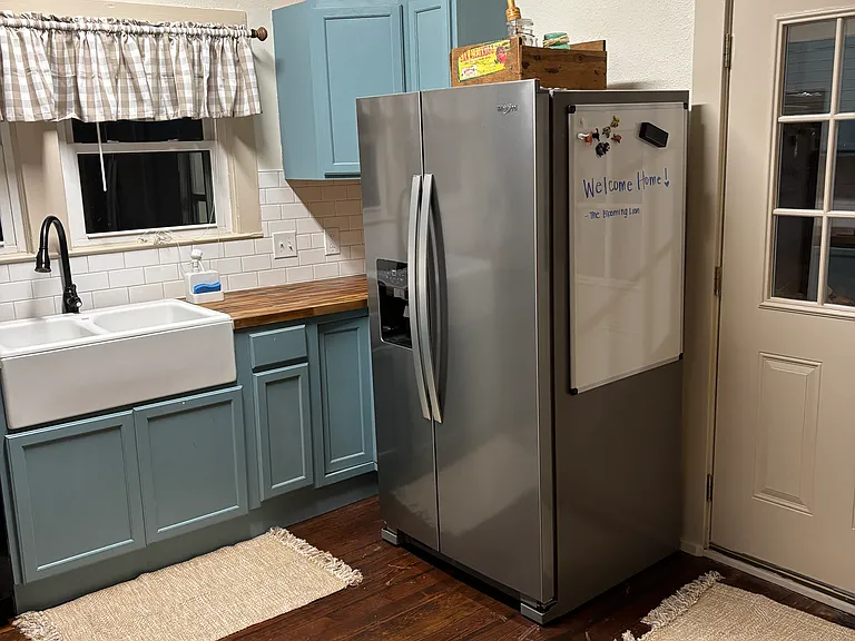 One of TWO refrigerators with freezers _ additional fridge/freezer in laundry room