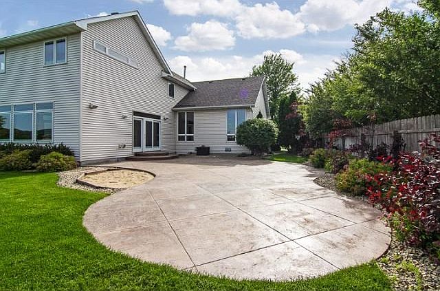 Accessed from the great room, the secluded patio is a wonderful extension of the main floor living space.
