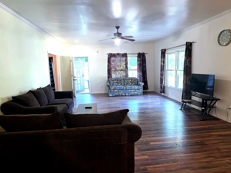 Shared space - Spacious living room with couches, TV, coffee table, sofa bed, foosball/table soccer and dining table