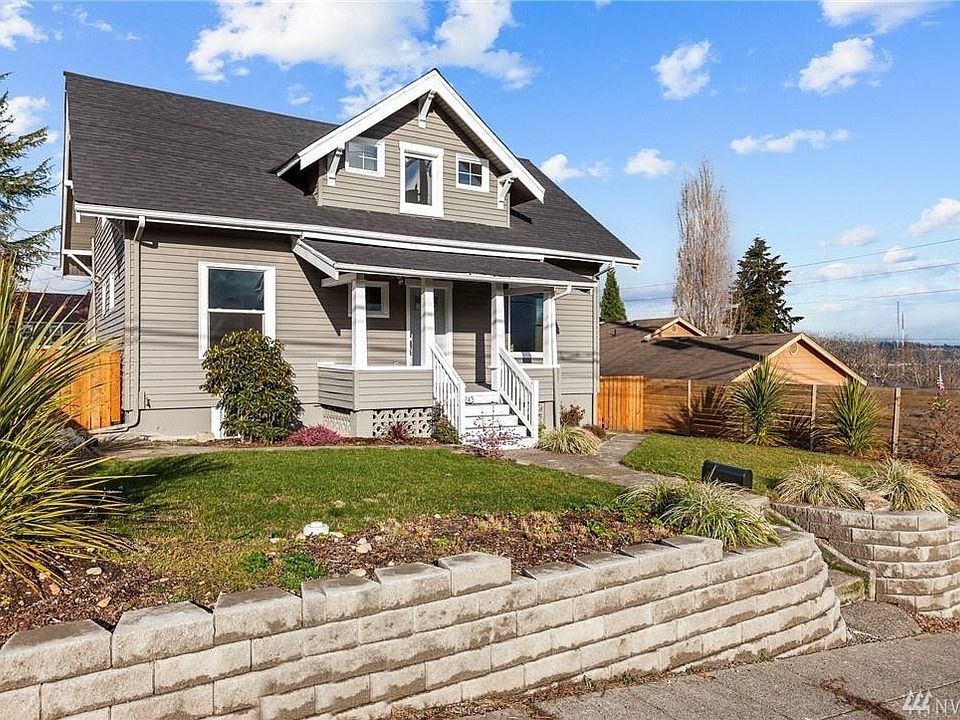 Front of home Parking available on street. There is an alley way behind the home with a HUGE enclosed parking area, carport, storage and outdoor area