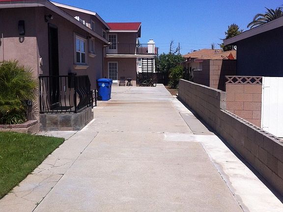 Upstairs unit located in back. 3 unit complex