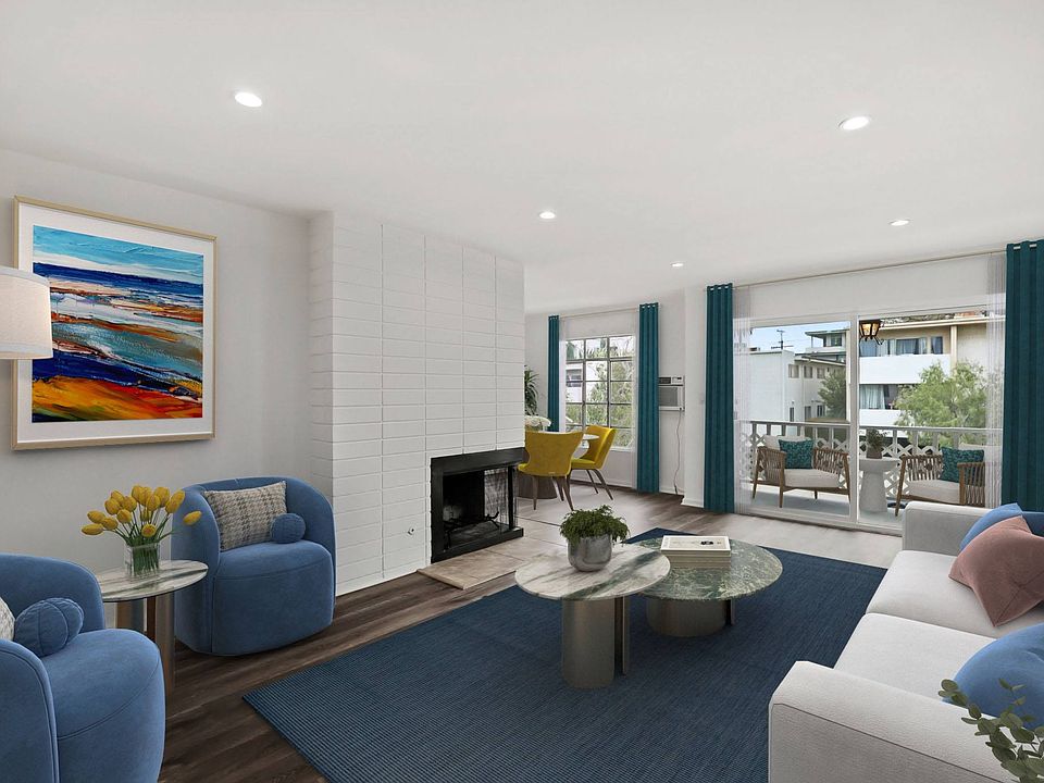 Dining, Living Room, and Patio with Large Windows