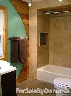 Second Floor Bathroom
						:
						Heated Tile Floor, Trimmed in Cedar and Travertine shower surround