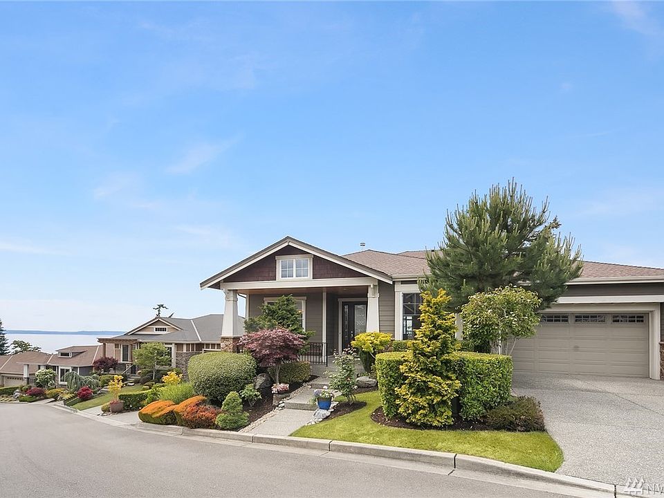 Front of home even showing a great view from the street. Driveway can easily accommodate 4 vehicles for guest parking.
