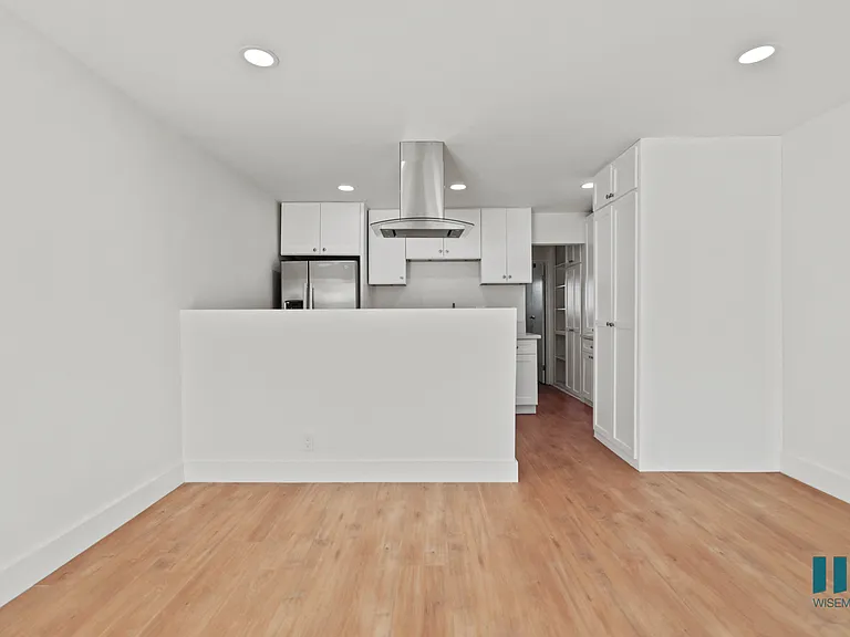 Open-Concept Kitchen, and Dining Room with Countertop Bar