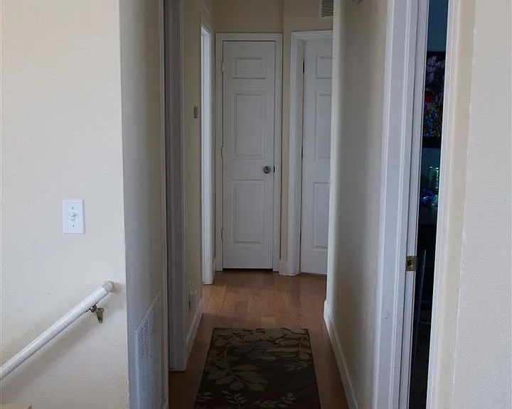 Upstairs hallway - 3 bedrooms + 1 bath, 2 storage closets