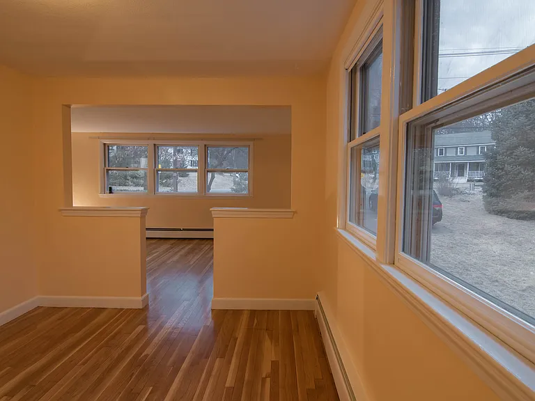 Dining room in back with view of living room.