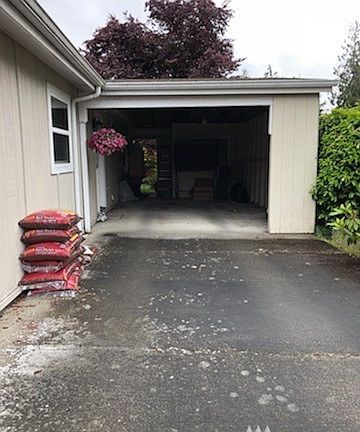 Side door from carport into utility room. 