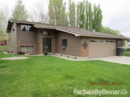 2068 Pima Drive
						:
						Front of house - new bushes, rock work & tree. Double car garage.