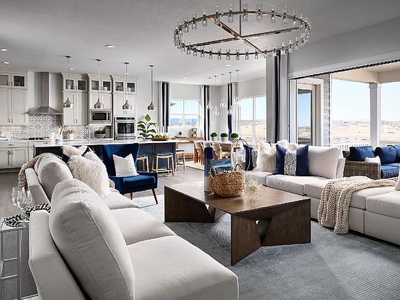 Open main level with the kitchen overlooking the casual dining and great room