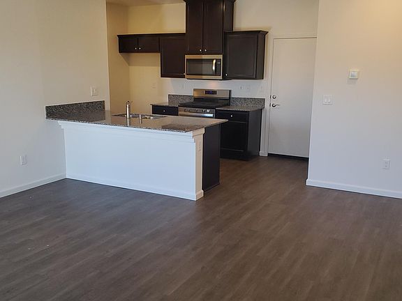 Living room and Kitchen (refrigerator will be provided)