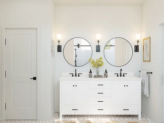 Primary bath with freestanding vanity and matte black fixtures
