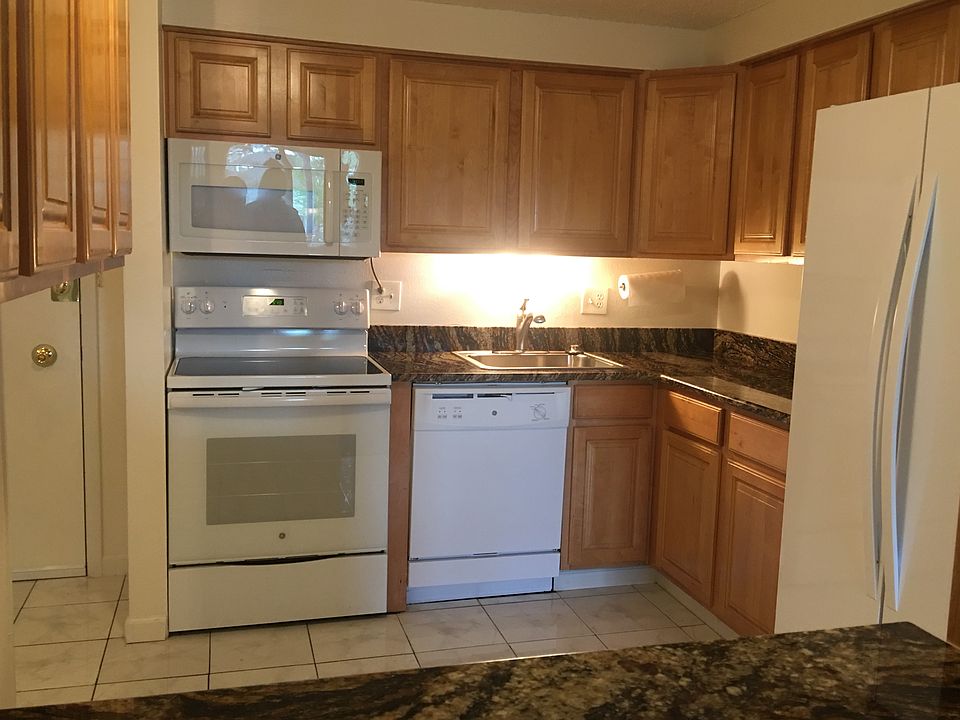 view from lvg rm to kitchen & front door