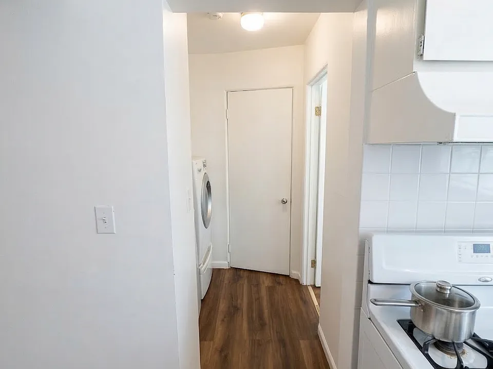 looking down the hallway off the kitchen