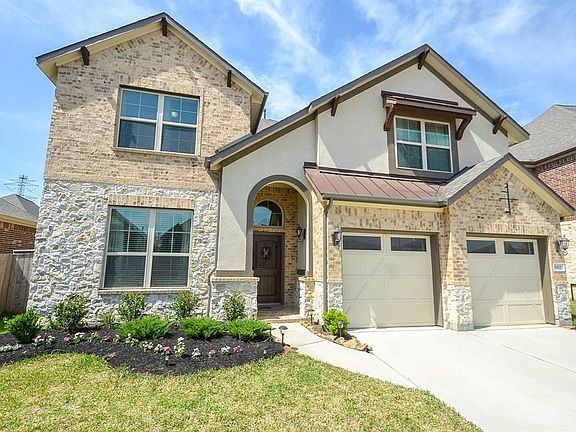 Desirable curb appeal with brick/stone elevation.  Double wide drive way on cul de sac street.