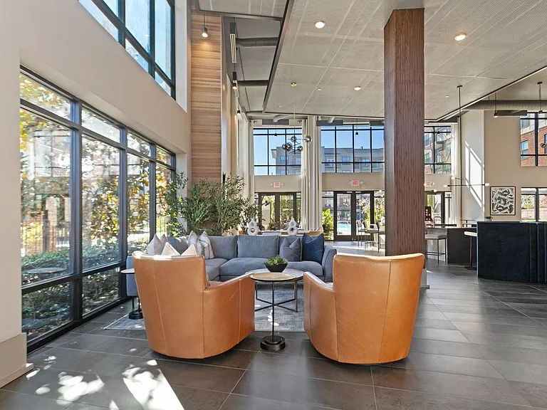 Sunlit lobby lounge for a warm welcome home