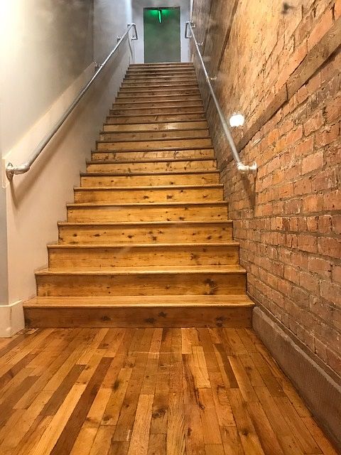 Interior stairwell of building from the E. Davis St.