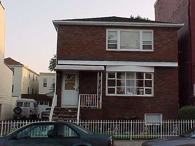 2 fam w/lot and 2 car garage