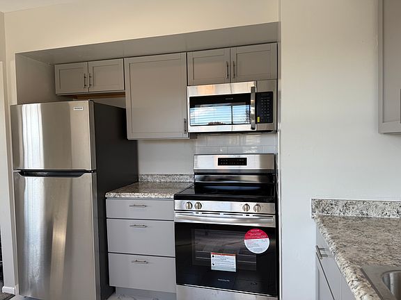 Fully equip Kitchen w/ new stainless steel appliances, new tile flooring, new cabinets & countertops.
