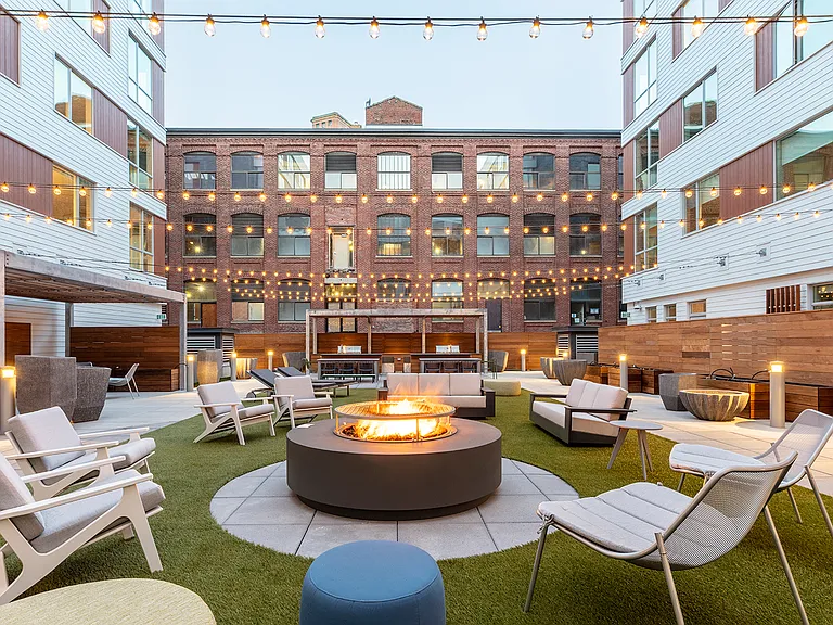 Your new home includes a large central social area with firepits, fitness center, and co-working spaces.
