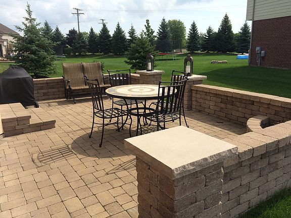 fire pit in corner of patio